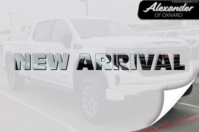 2024 GMC Sierra 1500 AT4 in Summit White — front three-quarter view