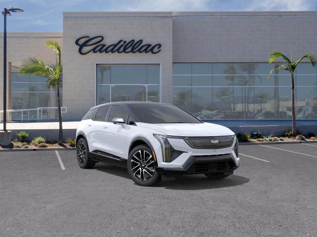 2026 Cadillac OPTIQ Sport in Vibrant White Tricoat — front three-quarter view