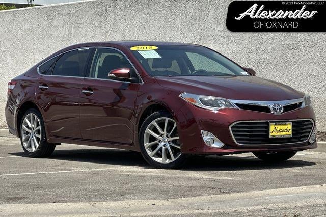 2015 Toyota Avalon Limited in Maroon — front three-quarter view