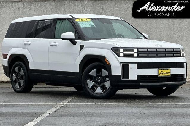 2026 Hyundai Santa Fe Hybrid SE in Serenity White — front three-quarter view